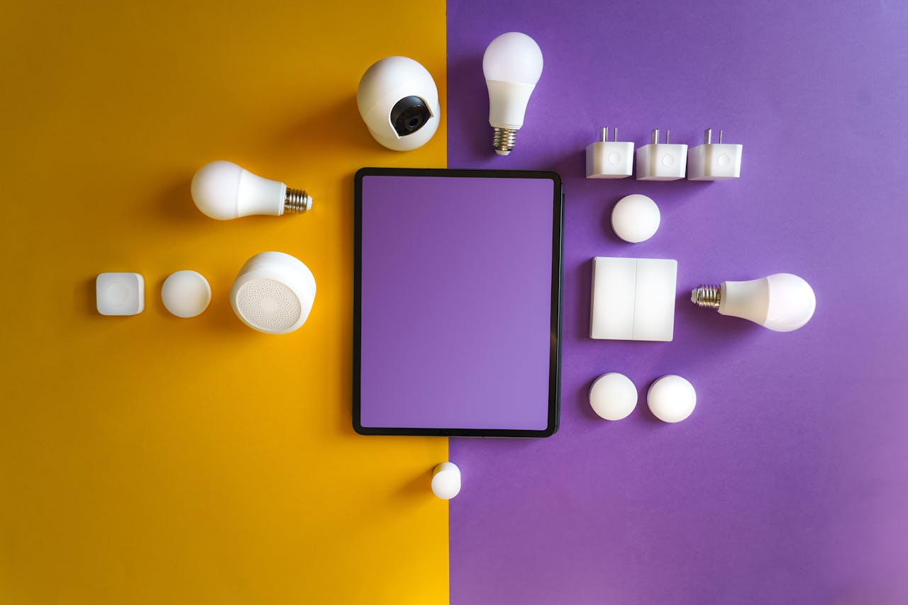 Innovative smart home gadgets arranged in a modern flat lay.